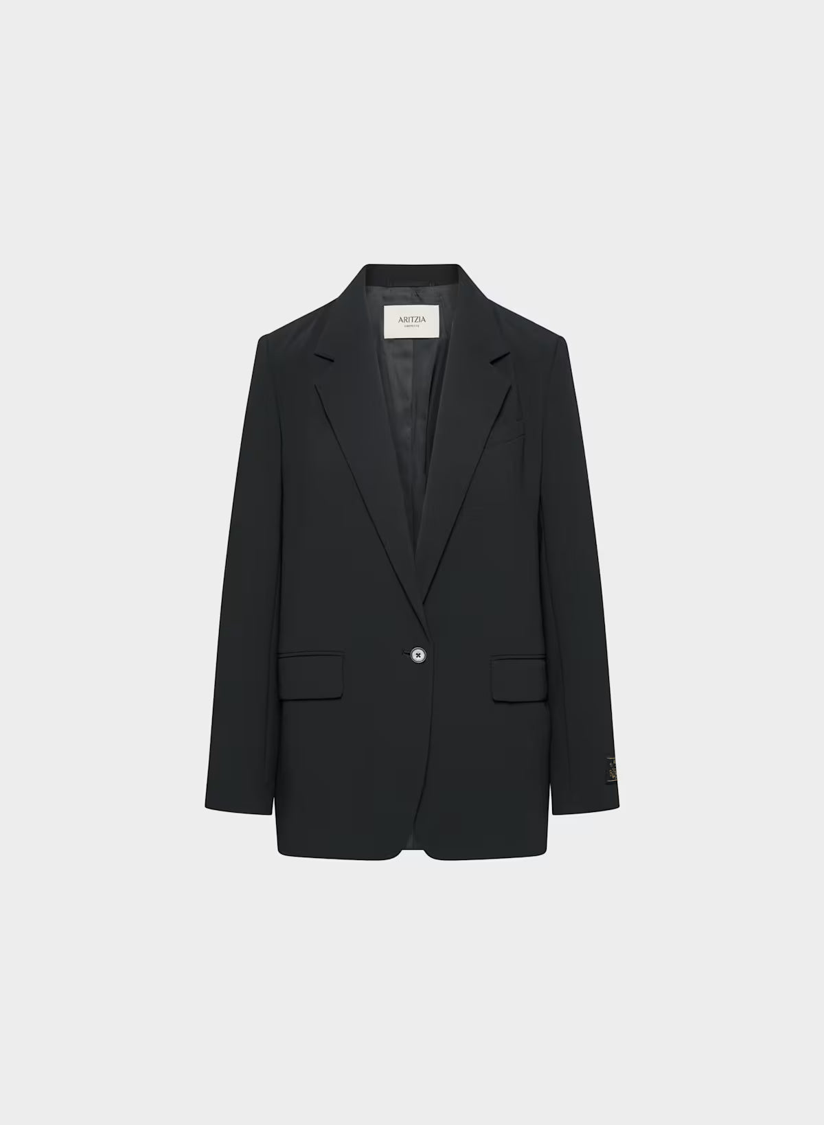 Black blazer on a light gray background