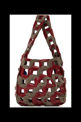 Red and brown woven handbag on a white background