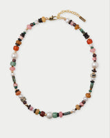 Multicolored beaded necklace with a gold clasp on a white background