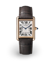 Cartier watch with brown leather strap on a white background