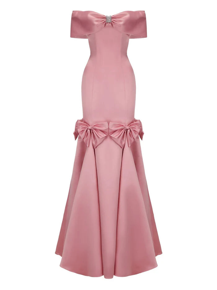 Pink off-shoulder gown with bow details on a white background