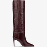 Brown knee-high boot with crocodile texture on a white background