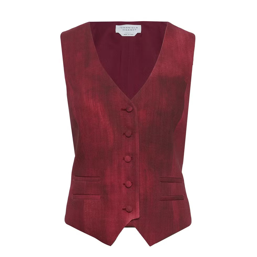 Red vest with buttons on a white background