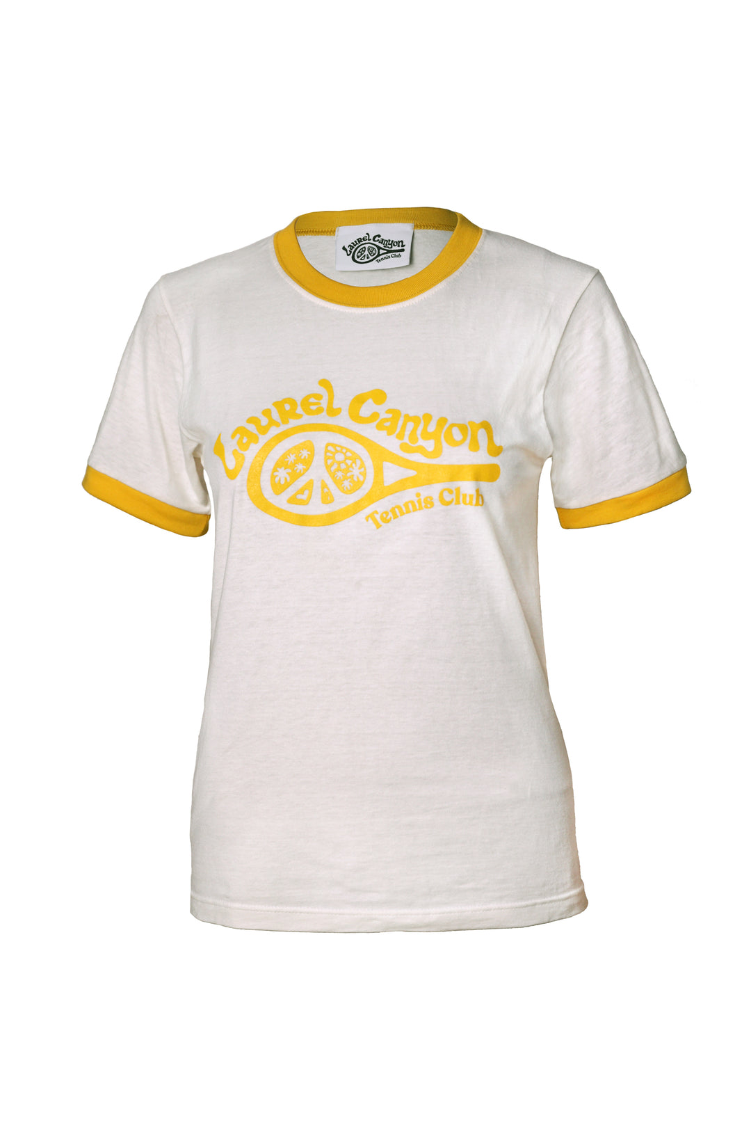 A white ringer t-shirt with yellow trim on the collar and sleeve cuffs, featuring a yellow graphic print on the front that reads 'Laurel Canyon Tennis Club' with a tennis racket and lemon slice design.