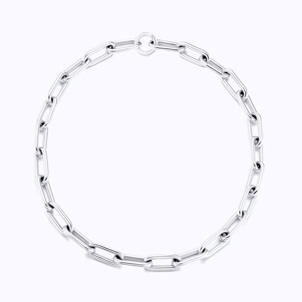 Silver chain bracelet on a white background