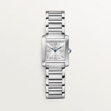Silver Cartier watch on a light gray background