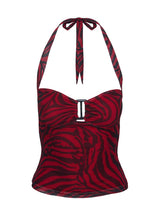 Red and black patterned halter top on a white background