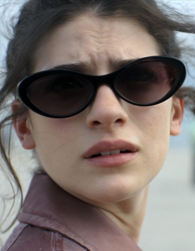 Shop Annie Jacobson's Black Oval Sunglasses from Sterling Point · Seek