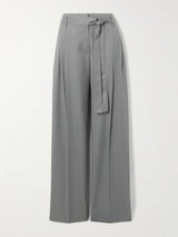 Michelle Pfeiffer as Stacy Clyburn Lonan Belted Pleated Silk Straight-Leg Pants · The Madison Outfits · Seek